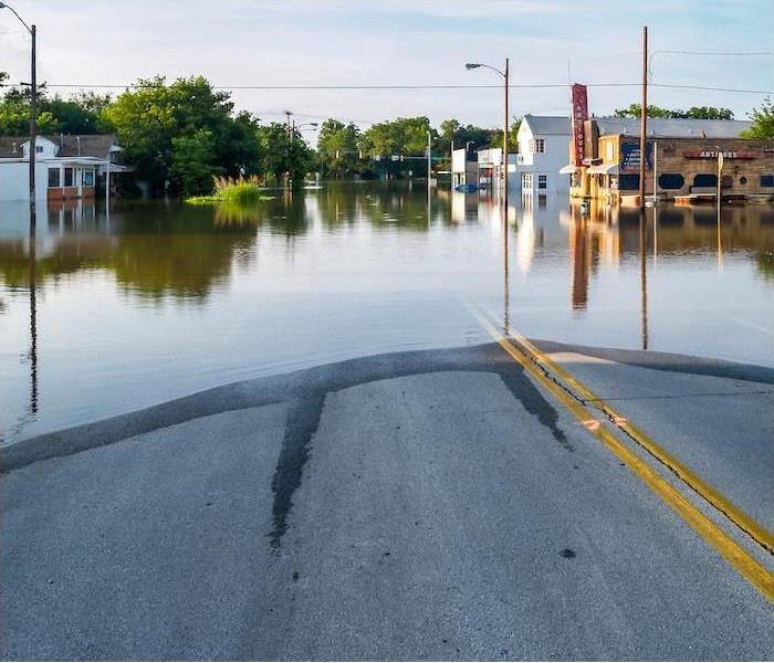 Flooded road intersection in the center of a small town